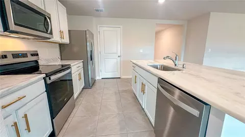 Kitchen - 12293 Mountain Island Trl, Parrish, FL 34219 photo 3 of 3