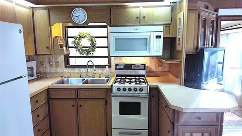 Kitchen - 3300 26th Ave E #42, Bradenton, FL 34208 photo 2 of 2