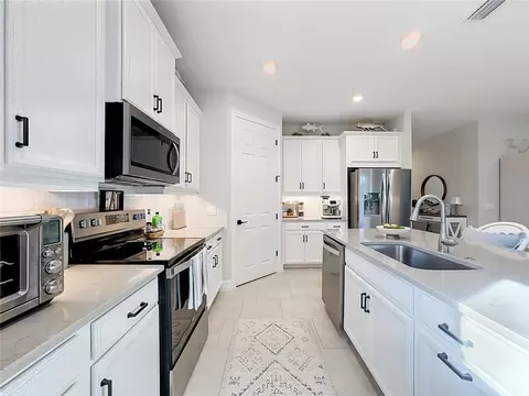Kitchen - 446 Ibiza Loop, Venice, FL 34292 photo 2 of 7