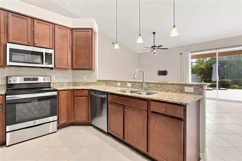 Kitchen - 13311 50th Ln E, Parrish, FL 34219 photo 3 of 5