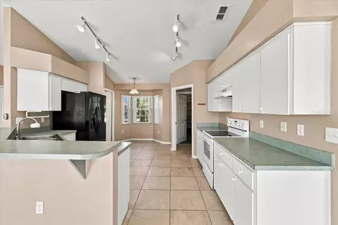 Kitchen - 7123 Summit Dr, Winter Haven, FL 33884 photo 2 of 5