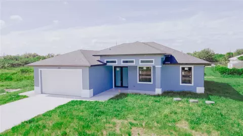 818 Frederick Reid St E, Lehigh Acres, FL 33974