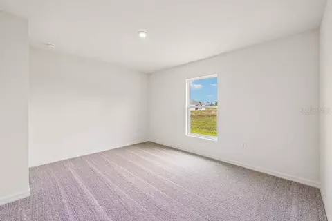 Bedroom - 831 Lamar St E, Lehigh Acres, FL 33974 photo 1 of 5