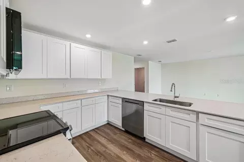 Kitchen - 831 Lamar St E, Lehigh Acres, FL 33974 photo 2 of 2