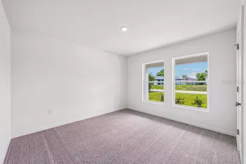 Bedroom - 831 Lamar St E, Lehigh Acres, FL 33974 photo 5 of 5