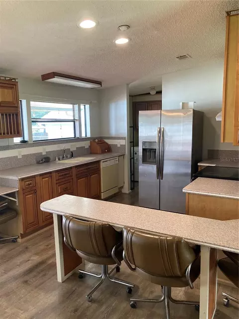 Kitchen - 1038 20th St, Okeechobee, FL 34974 photo 1 of 9