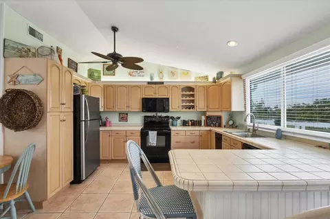 Kitchen - 261 Bocilla Dr, Placida, FL 33946 photo 2 of 4