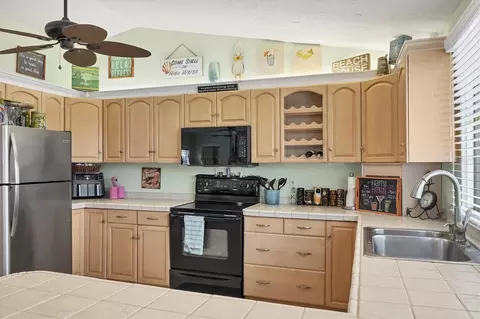 Kitchen - 261 Bocilla Dr, Placida, FL 33946 photo 3 of 4