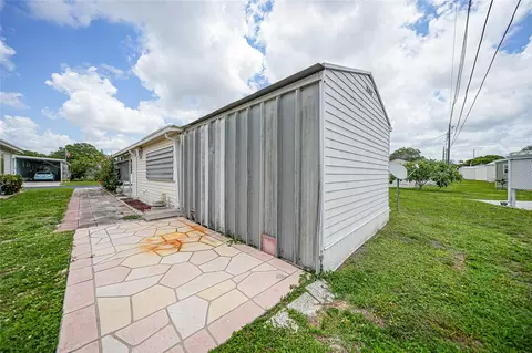 Exterior - 3450 Grapefruit Ln, Estero, FL 33928 photo 3 of 7