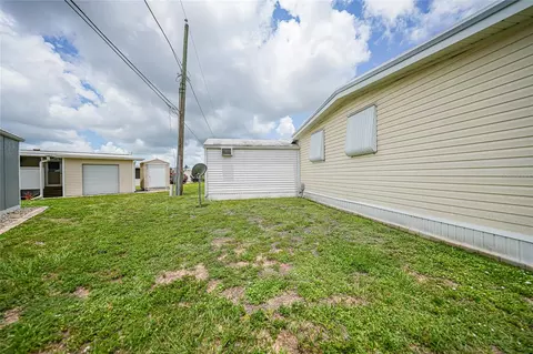 Exterior - 3450 Grapefruit Ln, Estero, FL 33928 photo 5 of 7