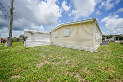 Exterior - 3450 Grapefruit Ln, Estero, FL 33928 photo 4 of 7