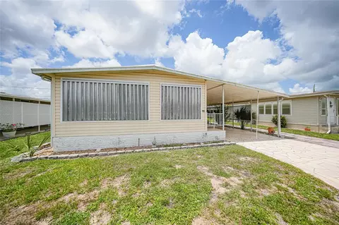 Exterior - 3450 Grapefruit Ln, Estero, FL 33928 photo 6 of 7