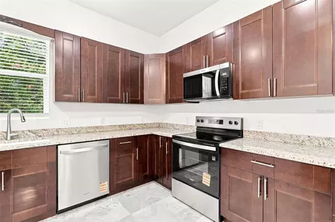 Kitchen - 1853 Della Dr, Naples, FL 34117 photo 2 of 8