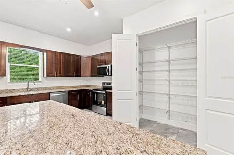 Kitchen - 1853 Della Dr, Naples, FL 34117 photo 5 of 8
