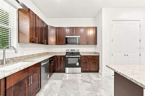 Kitchen - 1853 Della Dr, Naples, FL 34117 photo 3 of 8
