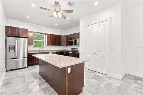 Kitchen - 1853 Della Dr, Naples, FL 34117 photo 8 of 8