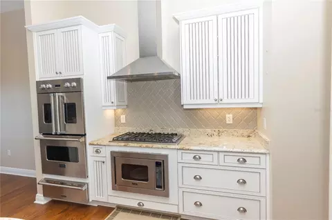Kitchen - 100 Buccaneer Bnd, Placida, FL 33946 photo 7 of 11