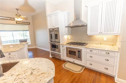 Kitchen - 100 Buccaneer Bnd, Placida, FL 33946 photo 10 of 11