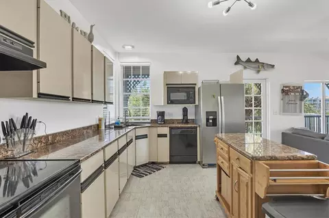 Kitchen - 310 Kettle Harbor Dr, Placida, FL 33946 photo 3 of 5