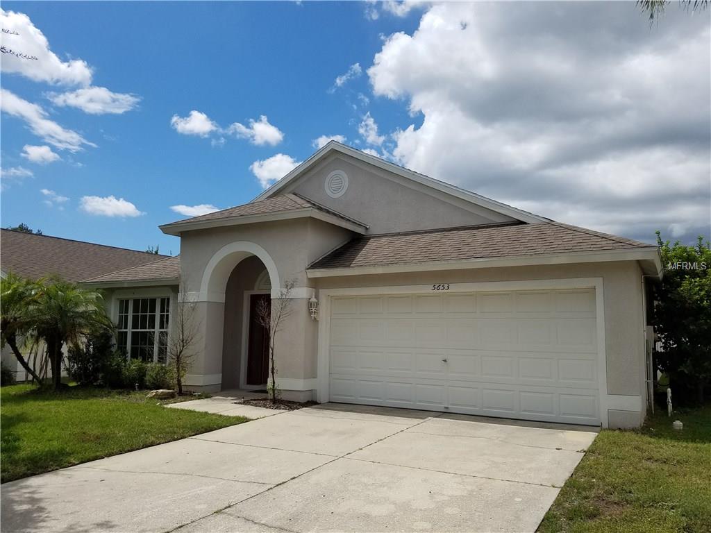 5653 Grindstone Loop, Wesley Chapel, FL 33544 photo 1