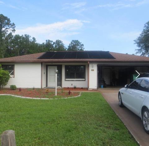 15 Bird Of Paradise Dr, Palm Coast, FL 32137