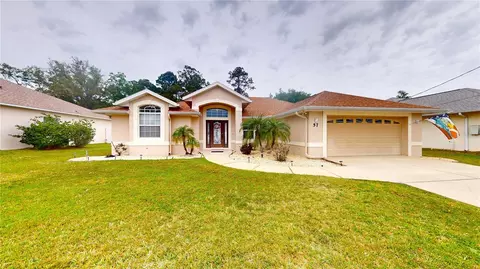 57 Woodbury Dr, Palm Coast, FL 32164