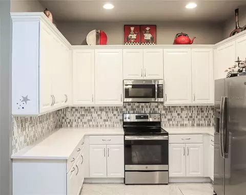 Kitchen - 875 Pinewood Dr, Ormond Beach, FL 32174 photo 3 of 6