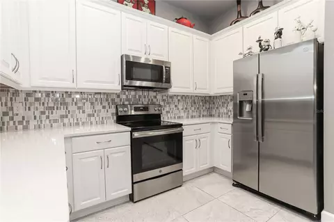 Kitchen - 875 Pinewood Dr, Ormond Beach, FL 32174 photo 4 of 6