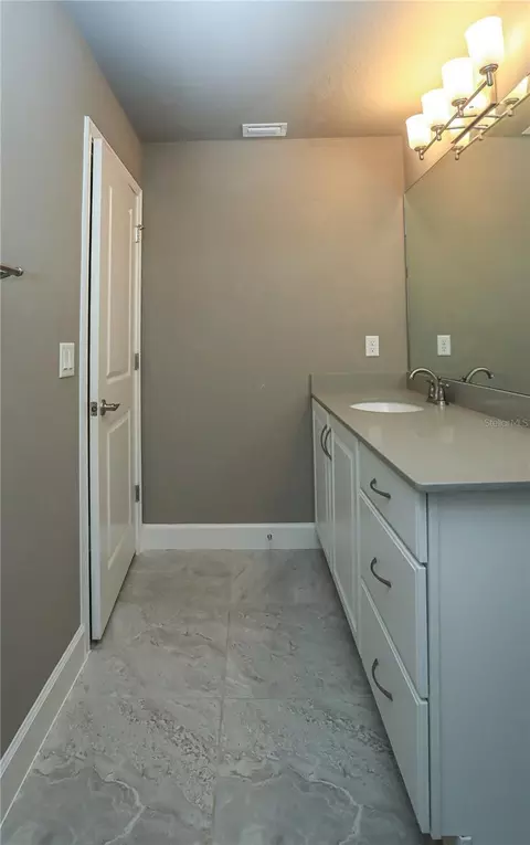 Bath - 875 Pinewood Dr, Ormond Beach, FL 32174 photo 8 of 15