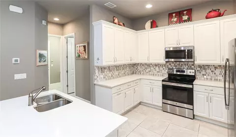 Kitchen - 875 Pinewood Dr, Ormond Beach, FL 32174 photo 2 of 6