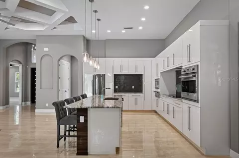 Kitchen - 708 Woodbridge Ct, Ormond Beach, FL 32174 photo 3 of 3