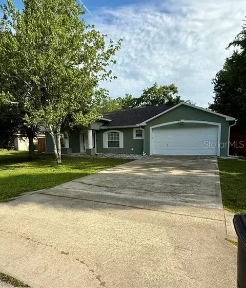 15 Poinsettia Ln, Palm Coast, FL 32164