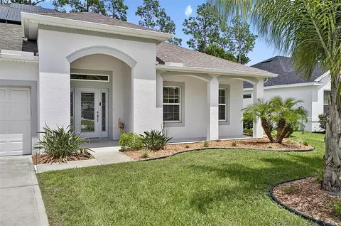 Exterior - 34 Bunker Hill Dr, Palm Coast, FL 32137 photo 4 of 12