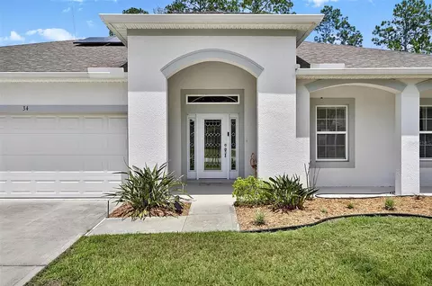 Exterior - 34 Bunker Hill Dr, Palm Coast, FL 32137 photo 5 of 12