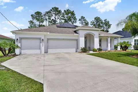 Exterior - 34 Bunker Hill Dr, Palm Coast, FL 32137 photo 2 of 12