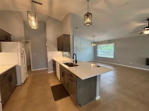 Kitchen - 908 Woodstream Ln, Ormond Beach, FL 32174 photo 3 of 4