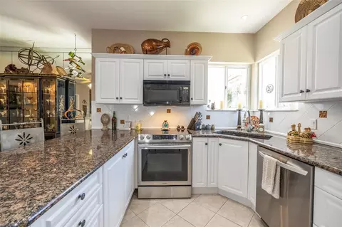 Kitchen - 11 Magnolia Dr S #11, Ormond Beach, FL 32174 photo 2 of 3