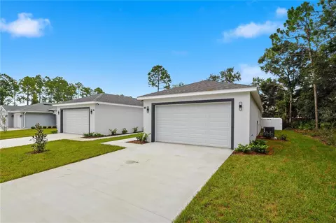 Exterior - 8 Second Path #A & B, Palm Coast, FL 32164 photo 5 of 8