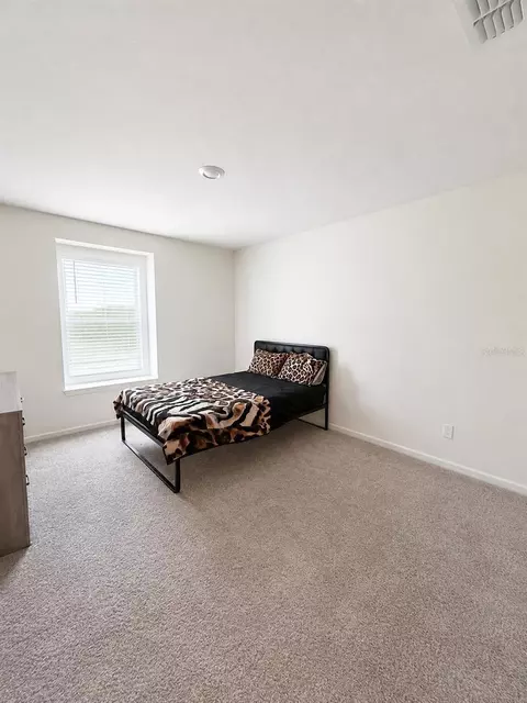Bedroom - 9589 Sandy Bluffs Cir, Parrish, FL 34219 photo 5 of 6