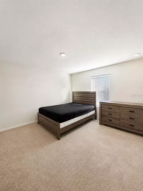 Bedroom - 9589 Sandy Bluffs Cir, Parrish, FL 34219 photo 3 of 6