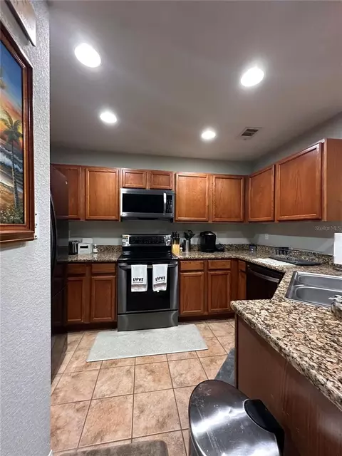 Kitchen - 4600 E Moody Blvd #8N, Bunnell, FL 32110 photo 5 of 7