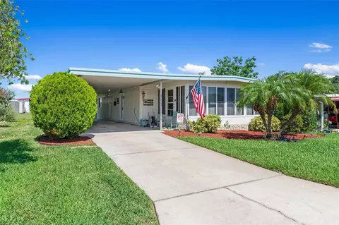 711 W Coach N Four Dr, Leesburg, FL 34748