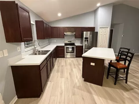Kitchen - 5041 Pine Needle Dr, Mascotte, FL 34753 photo 1 of 2