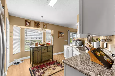 Kitchen - 12459 SE 176th Loop, Summerfield, FL 34491 photo 3 of 5