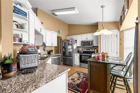 Kitchen - 12459 SE 176th Loop, Summerfield, FL 34491 photo 2 of 5