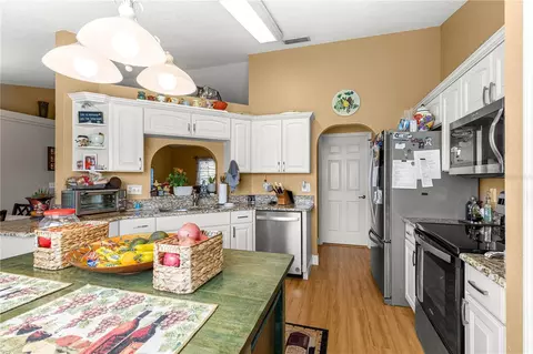 Kitchen - 12459 SE 176th Loop, Summerfield, FL 34491 photo 4 of 5