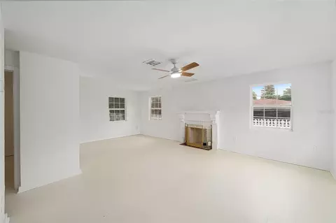 Living - 111 E Charlotte Ave, Eustis, FL 32726 photo 2 of 9