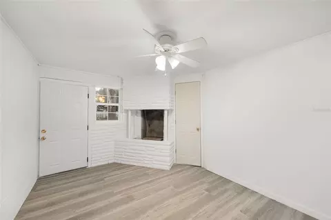 Living - 111 E Charlotte Ave, Eustis, FL 32726 photo 8 of 9
