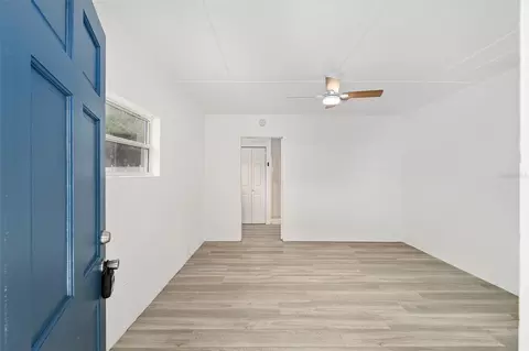 Living - 111 E Charlotte Ave, Eustis, FL 32726 photo 6 of 9