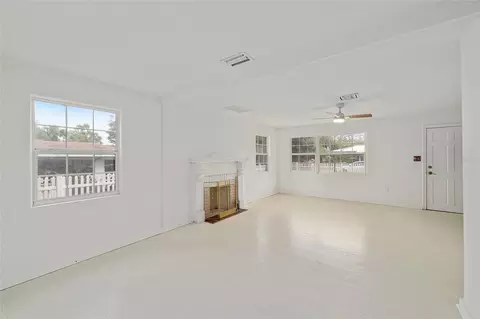 Living - 111 E Charlotte Ave, Eustis, FL 32726 photo 4 of 9